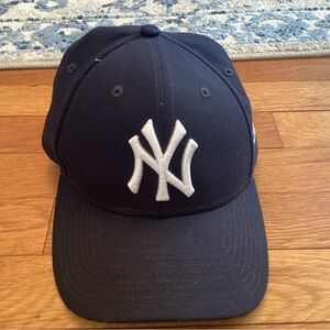 New Era Black Yankees Strapback Cap with White Patch and Red Accent
